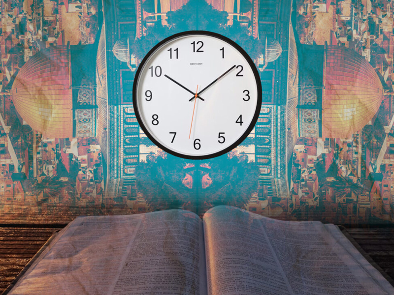 End times image showing a clock, the Bible, and a mirrored image of Jerusalem in the background.